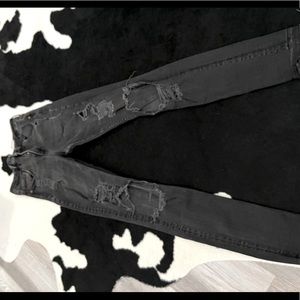 Dark grey distressed skinny denim